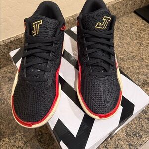 Jordan Tatum 1 Black and Metallic Gold Sneakers